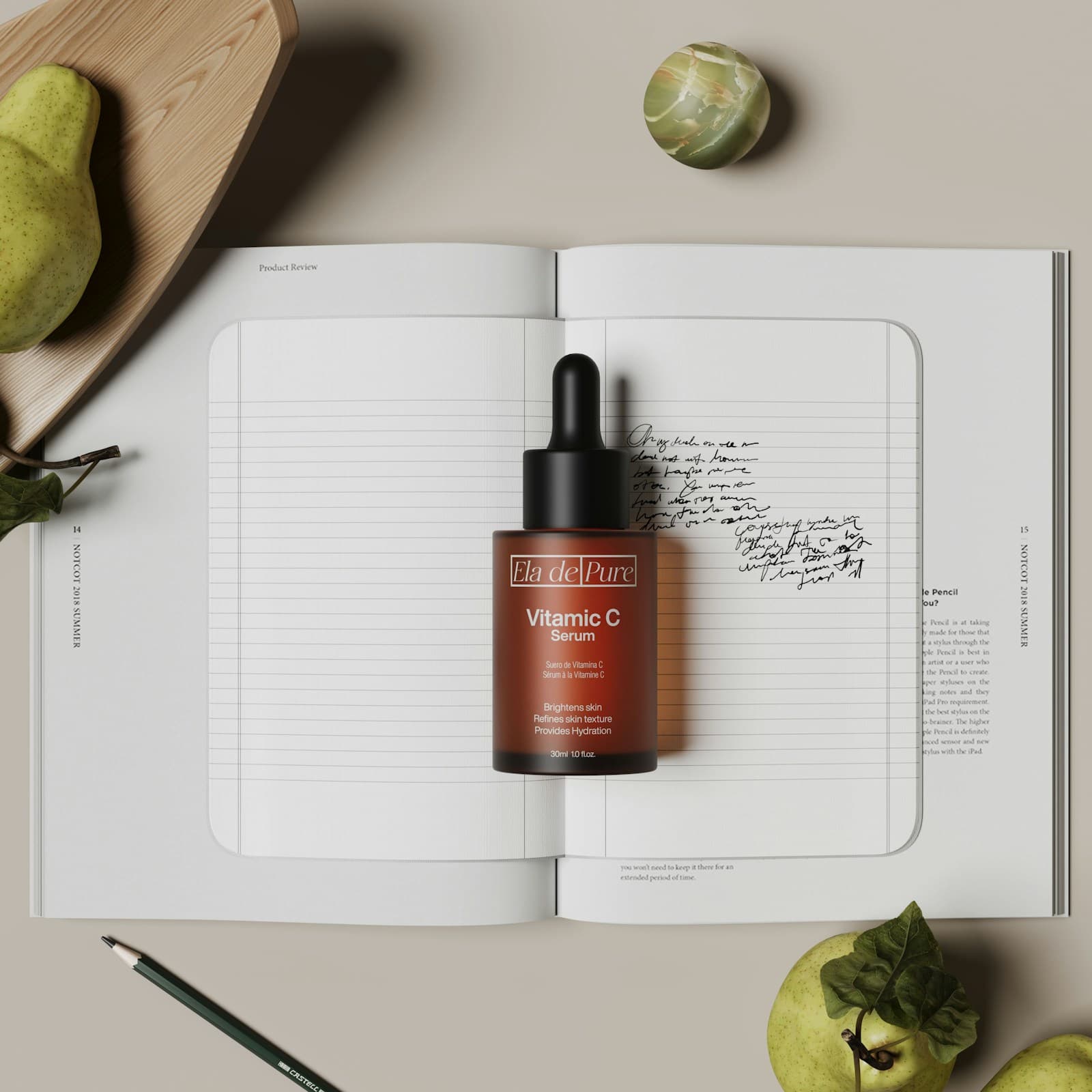 A vitamin C serum bottle resting on an open product-review notebook with pears nearby