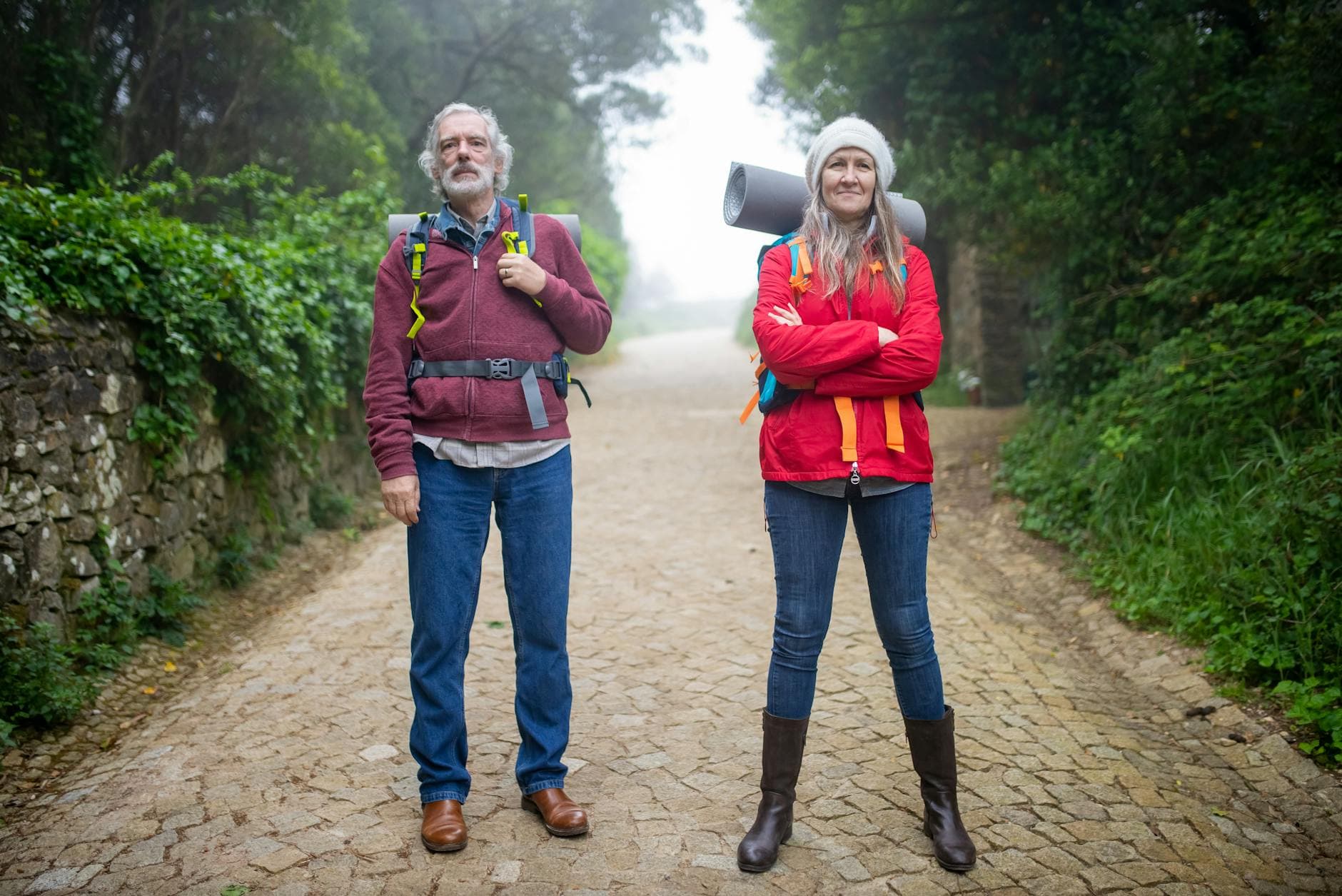 An active senior couple walking outdoors